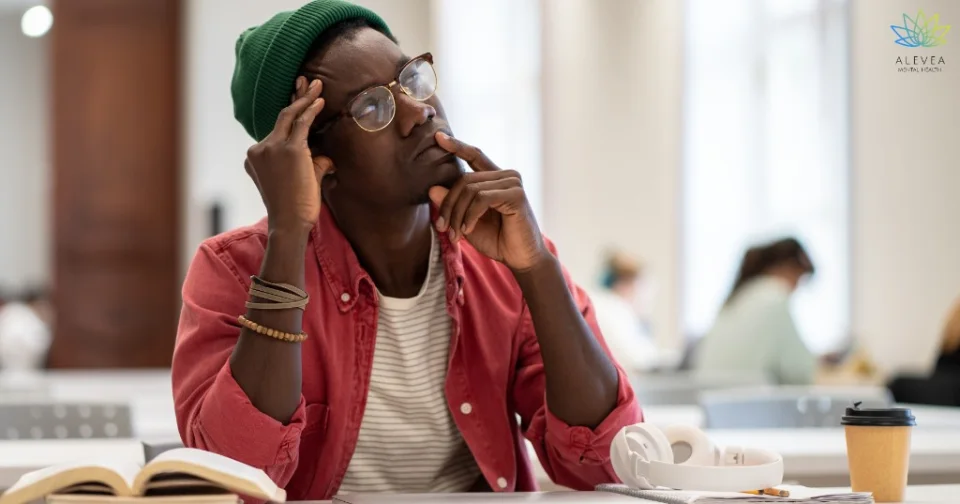 College student reflecting on focus and attention challenges